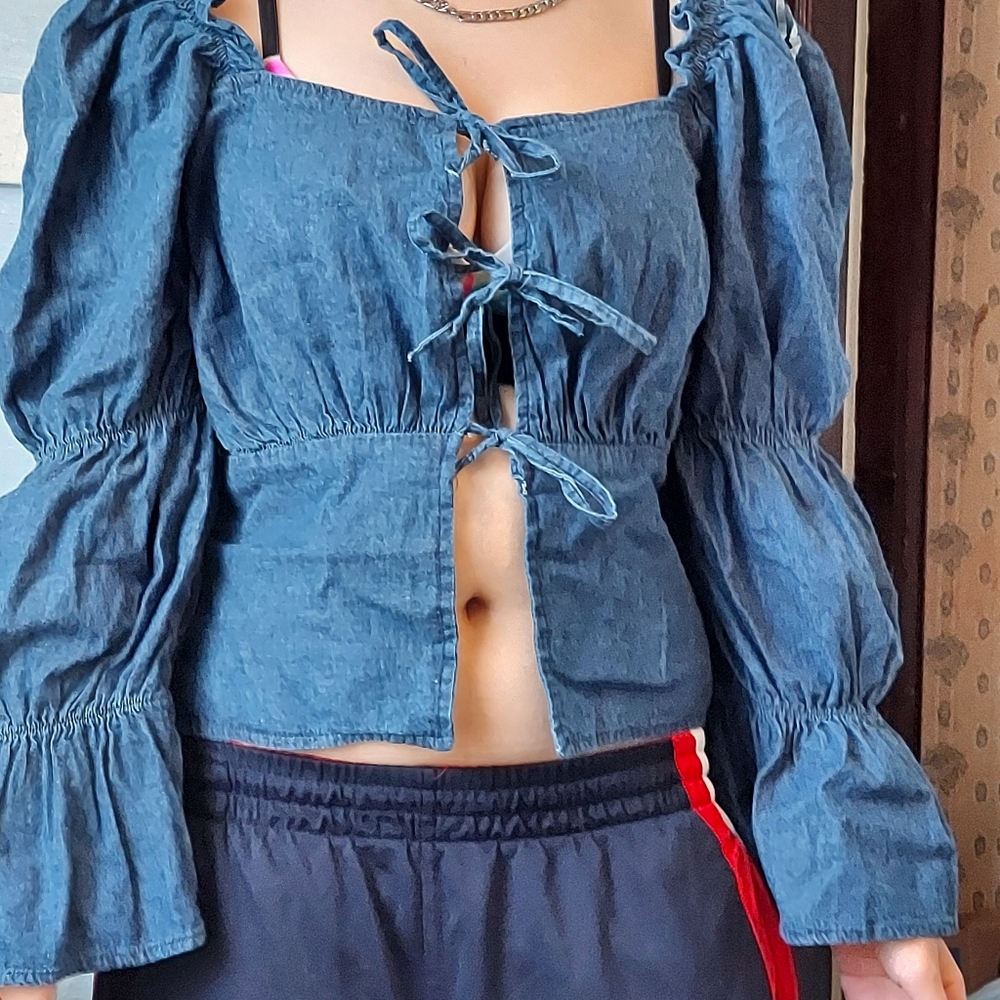 It is a taxi shirt, boho style, denim shirt size s